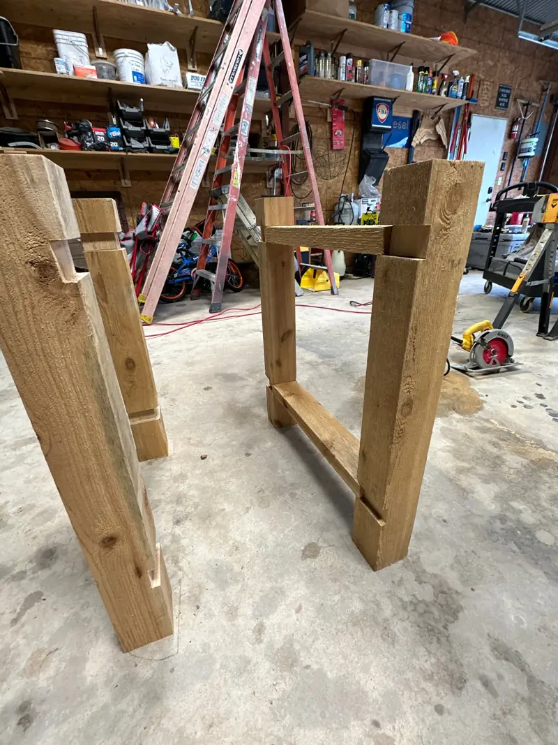 Cedar table legs cut and notched.