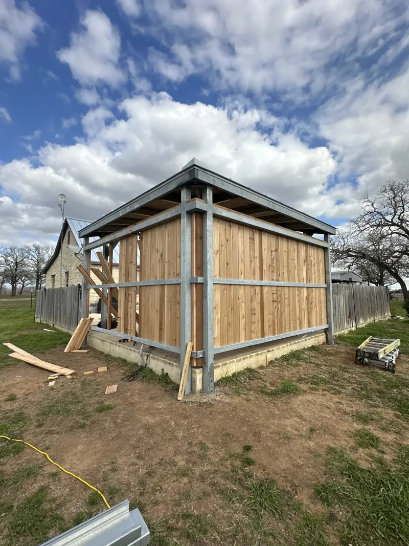 The galvanized steel frame closed in with cedar boards.